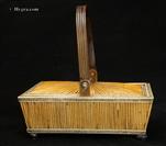 737SB: Anglo-Indian, Vizagapatam, box in the form of a basket, the wooden frame covered in porcupine quills, framed in ivory which is incised and decorated in black lacquer, with a horn handle. It stands on turned horn feet. Circa 1850. 737SB: Anglo-Indian, Vizagapatam, box in the form of a basket, the wooden frame covered in porcupine quills, framed in ivory which is incised and decorated in black lacquer, with a horn handle. It stands on turned horn feet. Circa 1850.