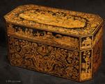 TC600: A very fine penwork tea chest, the penwork depicting scenes from the Silk Road. Inside there are two lift out tea canisters  and a cut glass Irish sugar bowl. 