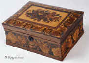 SB440: A rosewood veneered Tunbridge ware Sewing box, the slightly domed top inlayed with a display of roses depicted in micro mosaic, framed by a wide banding of Berlin wool-work in micro mosaic and bandings of contrasting light and dark wood; there is a further banding of Berlin wool work design encircling the box which has concave sides. The inside retains its original liftout tray which is lined with its original paper. Inside the lid is lined in red silk. circa 1850 Enlarge Picture SB440: A rosewood veneered Tunbridge ware Sewing box, the slightly domed top inlayed with a display of roses depicted in micro mosaic, framed by a wide banding of Berlin wool-work in micro mosaic and bandings of contrasting light and dark wood; there is a further banding of Berlin wool work design encircling the box which has concave sides. The inside retains its original liftout tray which is lined with its original paper. Inside the lid is lined in red silk. circa 1850 Enlarge Picture