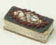 A small, charming "fancy" made in cardboard and decorated with sea shells and seeds. English, circa 1880.